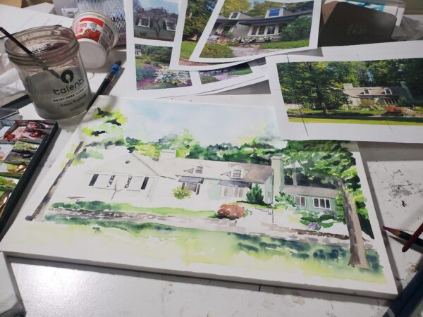 Photo of Watercolor House Portrait in Progress with watercolor palette, brushes, etc.